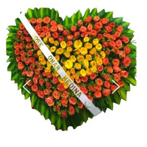 corona fúnebre tapizada en rosas